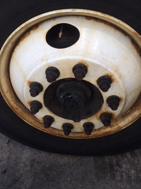 A close up of a wheel with a hole in it