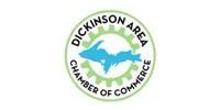 Dickinson Area Chamber of Commerce logo with a blue map of Michigan's Upper Peninsula in a green gear.