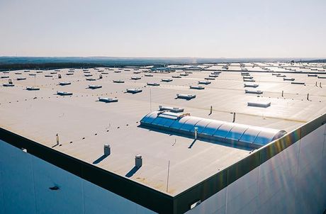 An aerial view of the roof of a large building.