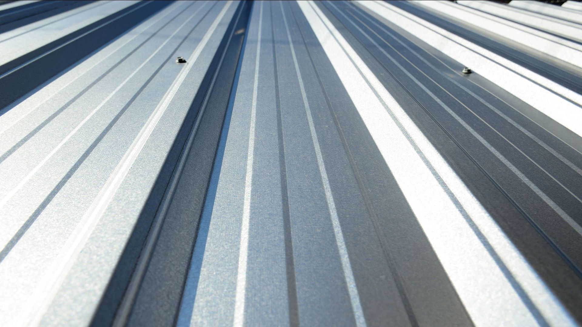 A close up of a metal roof that looks like a highway