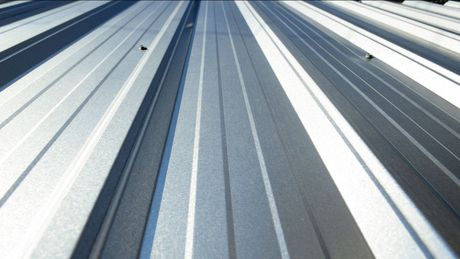 A close up of a metal roof that looks like a highway