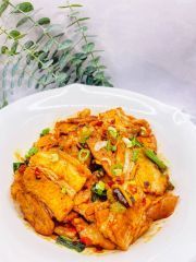 A close up of a plate of food on a table.