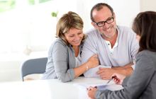 Couple having comfortable conversation with an agent