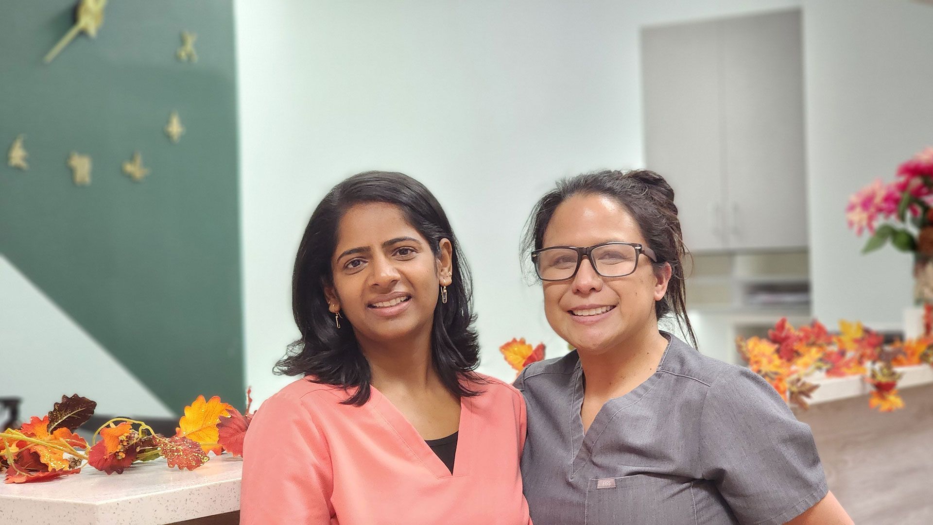 dentist with dental assistant