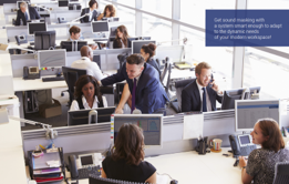 Office workers in an open-plan office, interacting at desks with computers, with text overlay.