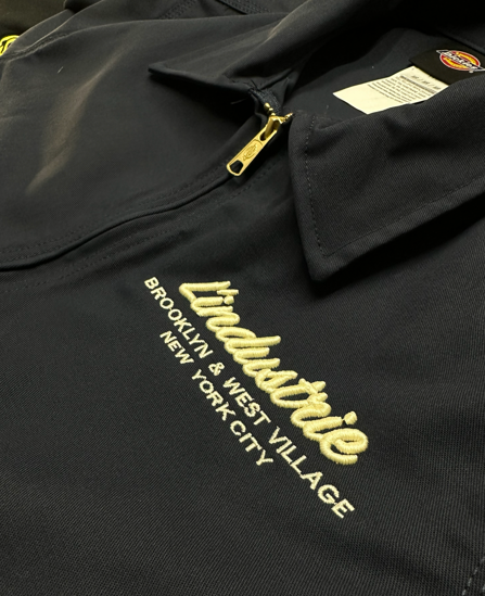 Navy blue jacket with gold zipper and 