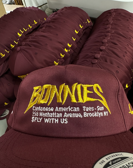 Maroon baseball caps with 