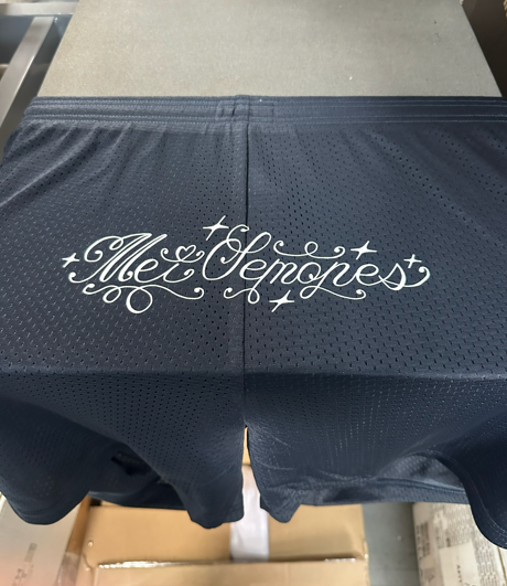 Dark blue mesh shorts with embroidered 