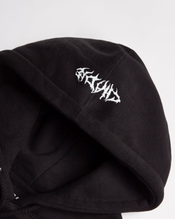 Black hoodie with white, stylized text on the hood.