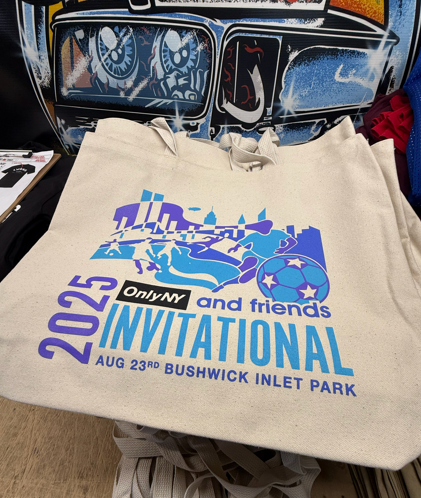 Beige tote bag with a blue and purple 