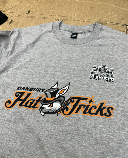 Gray Danbury Hat Tricks t-shirt with logo of rabbit in top hat, and 