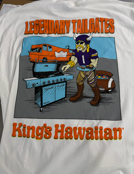 A Viking grilling at a tailgate, King's Hawaiian shirt design with an orange van and football.
