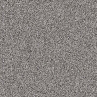 Close-up of gray, textured surface, possibly carpet or fabric.