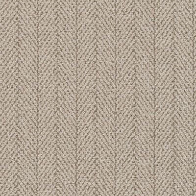 Beige herringbone patterned carpet.