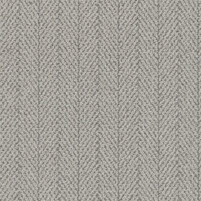 Light gray herringbone carpet pattern.