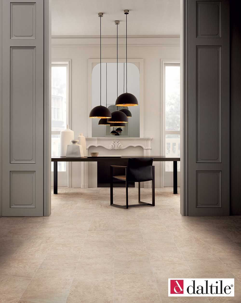 Elegant dining room with chandelier, table, chair, and fireplace, featuring Daltile flooring.