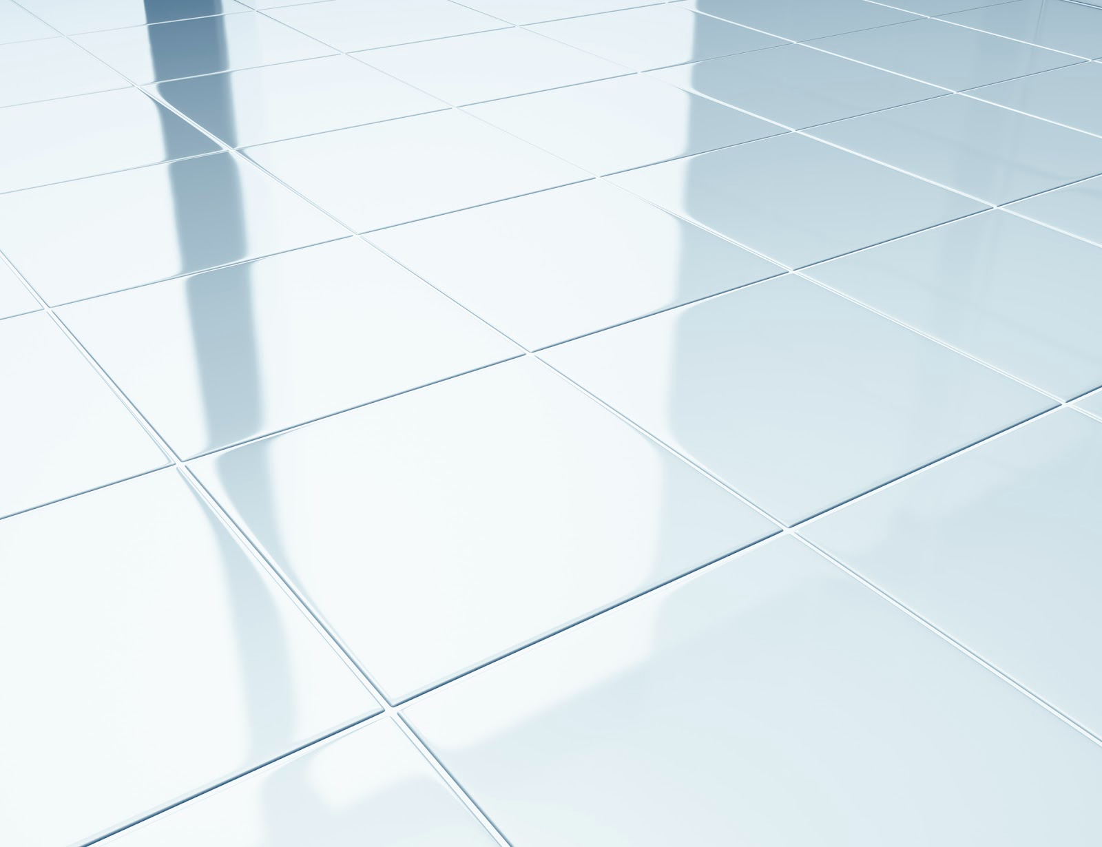 Light blue glossy tiled floor, reflections visible.