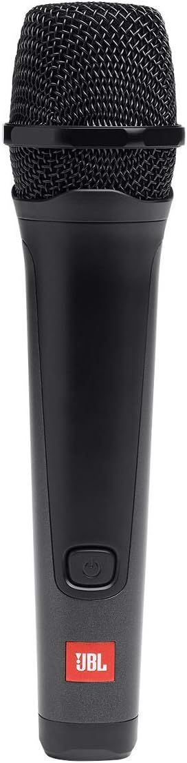 A black jbl microphone is sitting on a white surface.
