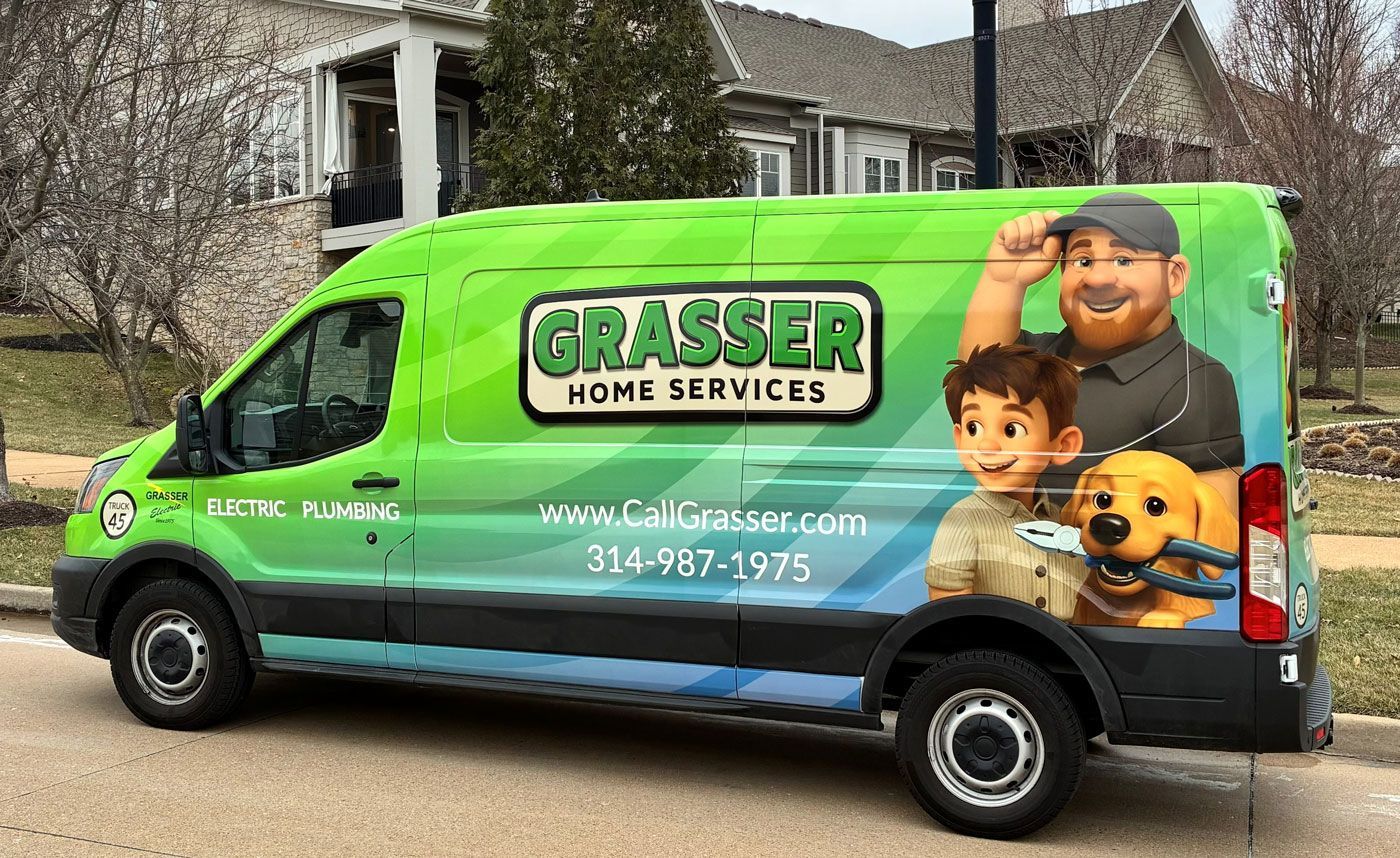 Green Brasser Home Services van with company logo and cartoon mascot graphics parked outside a house