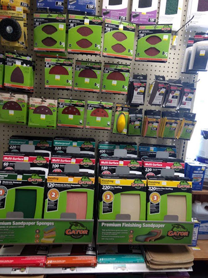 A display of gator sandpaper in a store