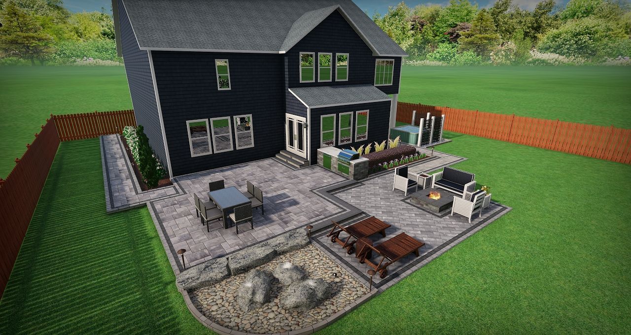 an aerial view of a house with a patio and a fire pit