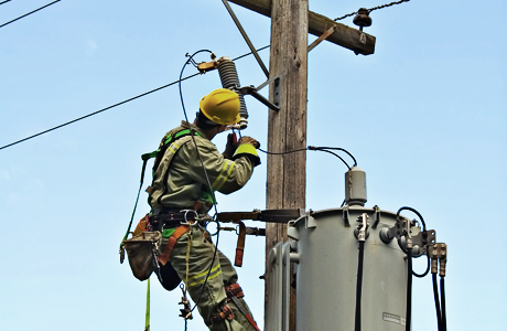 Lineman installing power lines