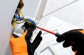 Electrician fixing a wire