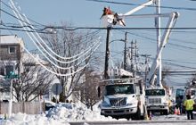 Electric contractor fixing poles and power lines