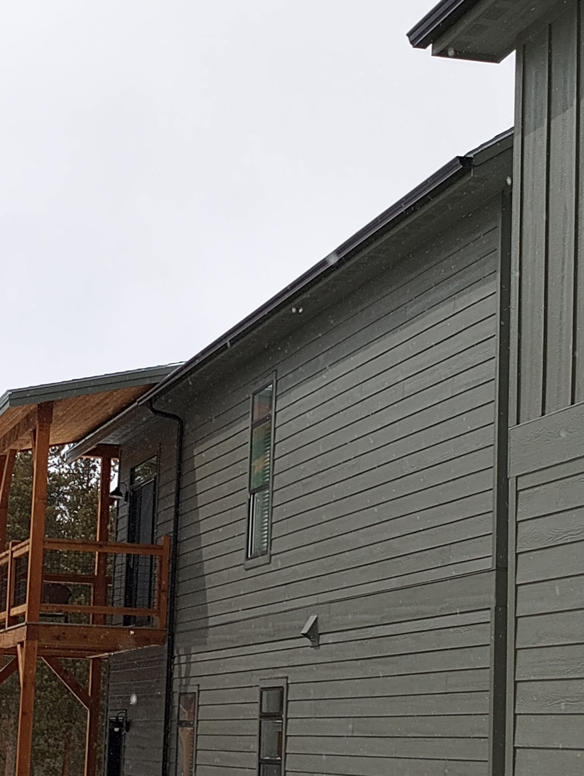 Beautiful seamless gutter of a gray property