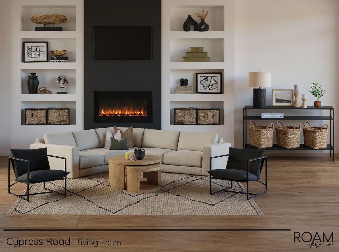 Living room with a sofa, chairs, rug, fireplace, shelves, and decor.
