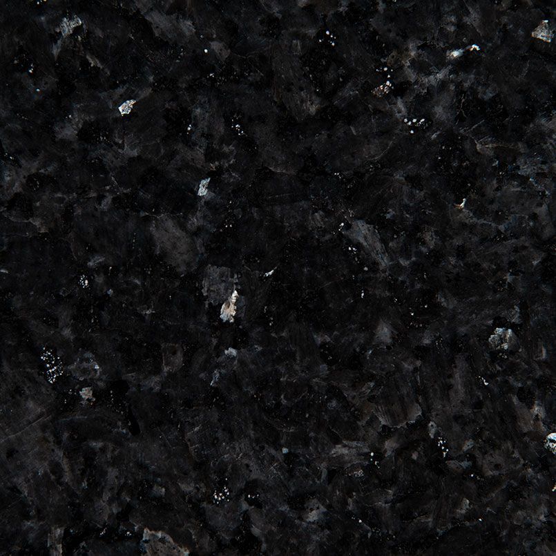 Black granite countertop with flecks of lighter minerals.