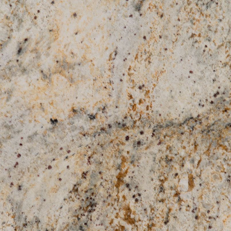 Cream-colored granite countertop with brown and black speckles and veins.
