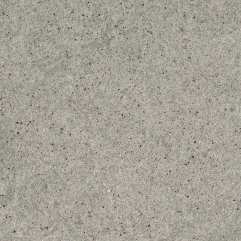 Light gray stone surface with small dark brown flecks.