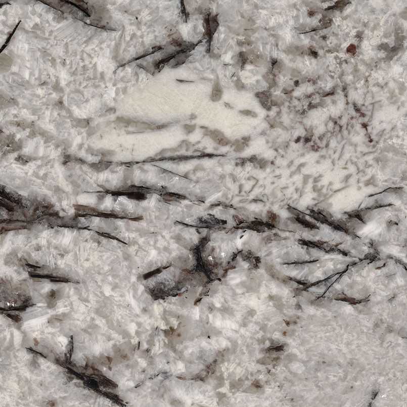 Close-up of granite countertop with white, gray, and black flecks.