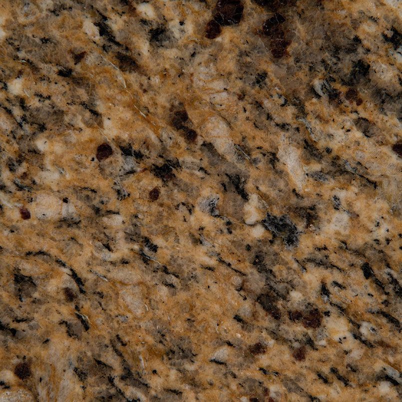 Golden brown granite with black and white speckles.