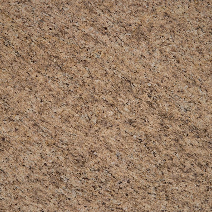 Tan granite countertop with dark flecks.