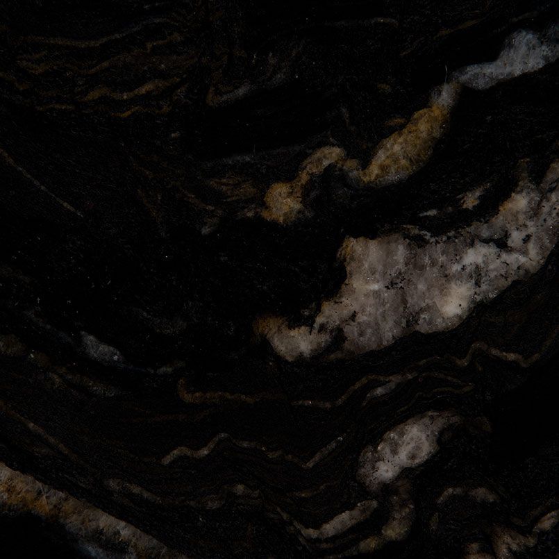 Black marble with swirling gold and white veining.