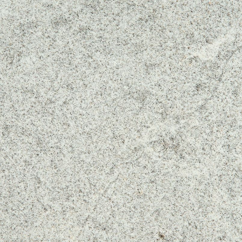 White granite countertop with speckled gray and black flecks.