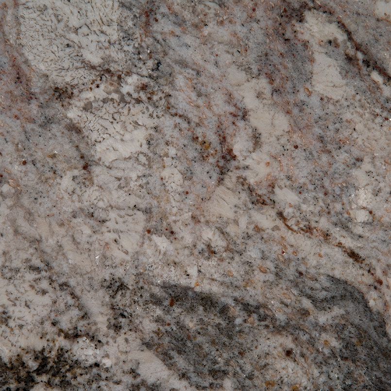 Close-up of granite countertop with swirling patterns in white, gray, and brown.