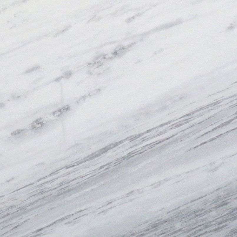 White marble surface with gray veining.