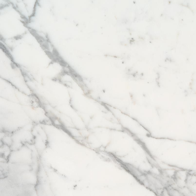 White marble surface with gray veining.