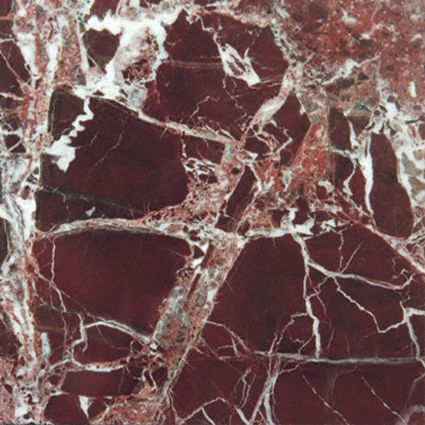Red marble with white veining.