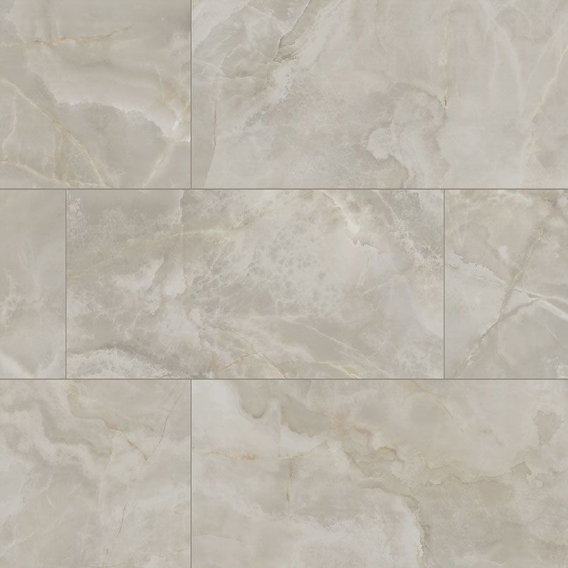 Light beige tile with marble-like veining. Rectangular pattern, subtle color variations.