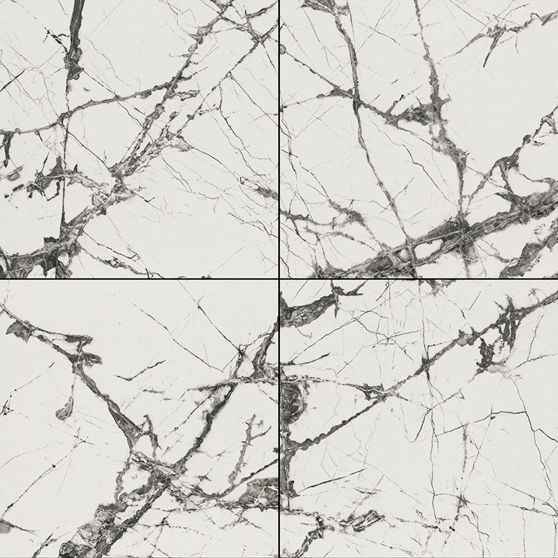 White marble tile with gray veining, arranged in a grid of four squares.