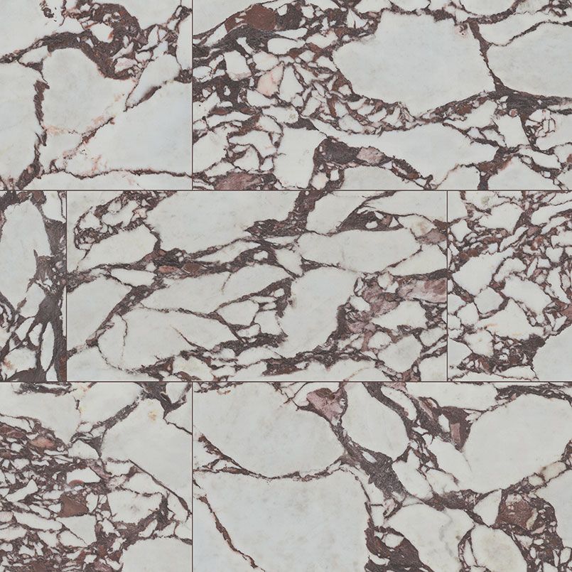 White and brown marbled stone tile pattern.