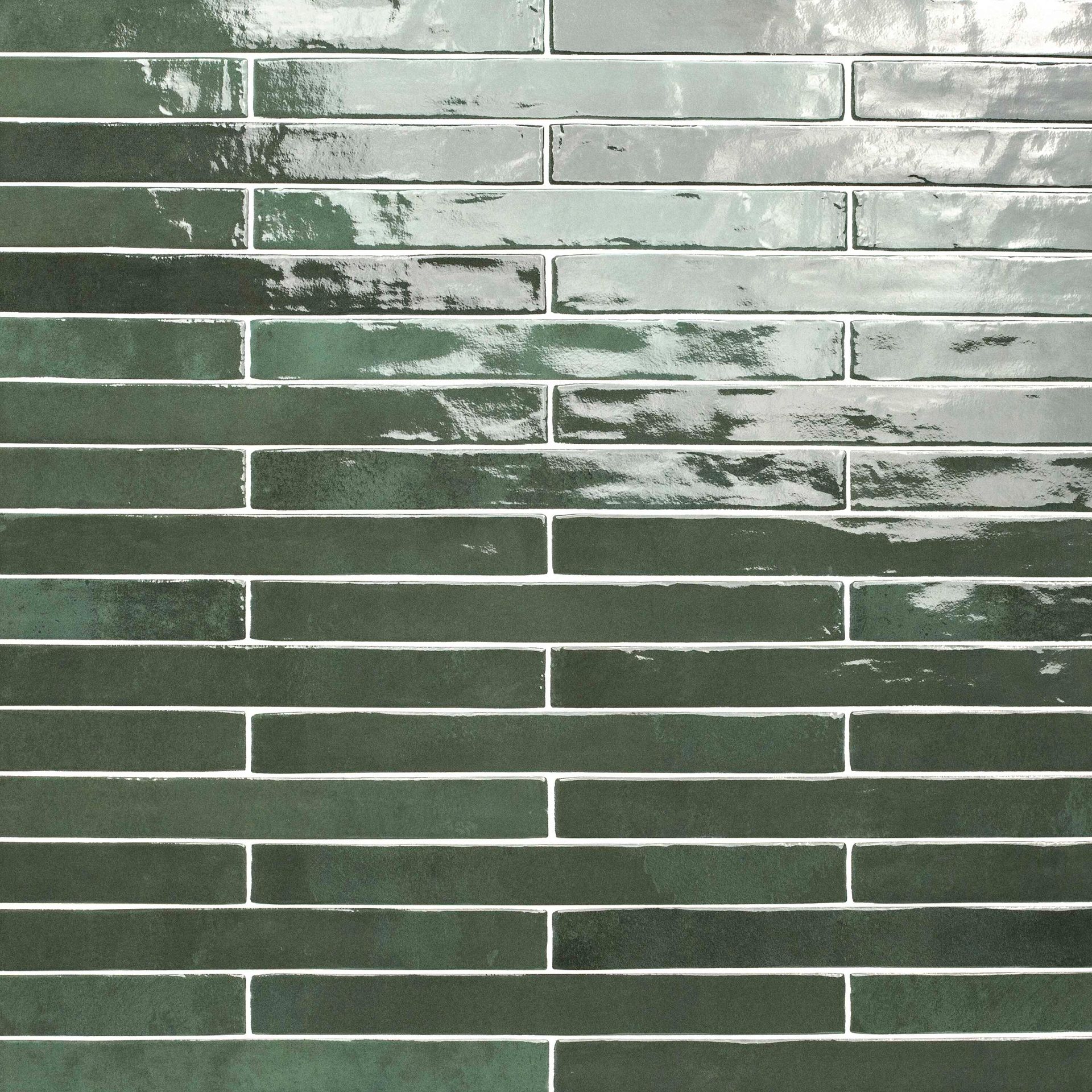 Green and white rectangular tiles in a staggered pattern, with distressed and textured surface.