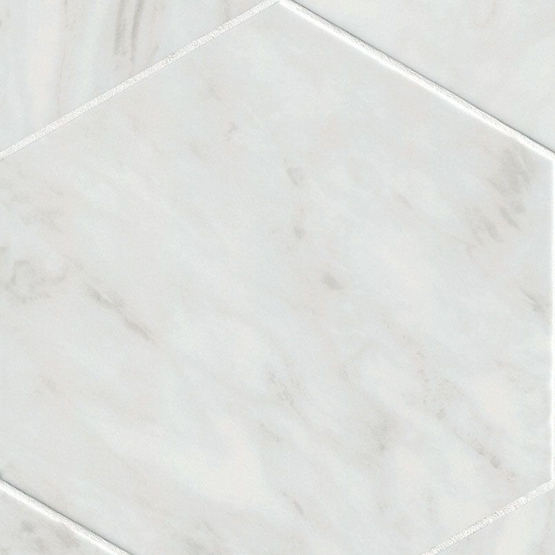 White marble hexagonal tile with subtle veining.