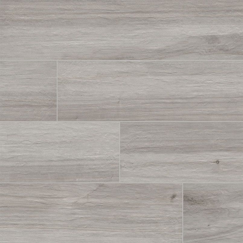 Light gray wood-look ceramic tile flooring with a linear grain pattern.