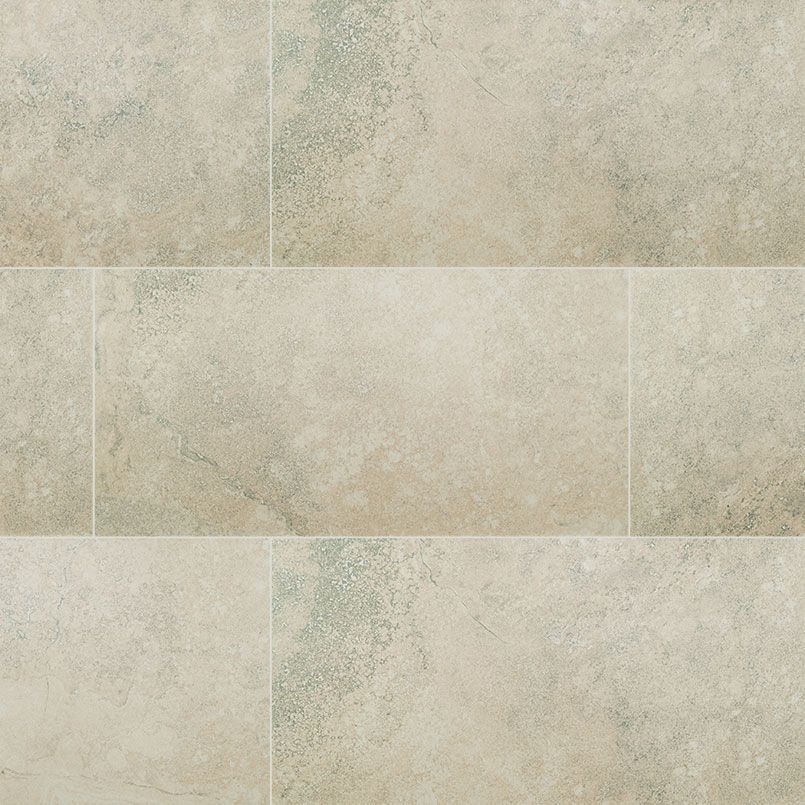 Beige rectangular tiles with mottled surface and subtle blue-green accents.
