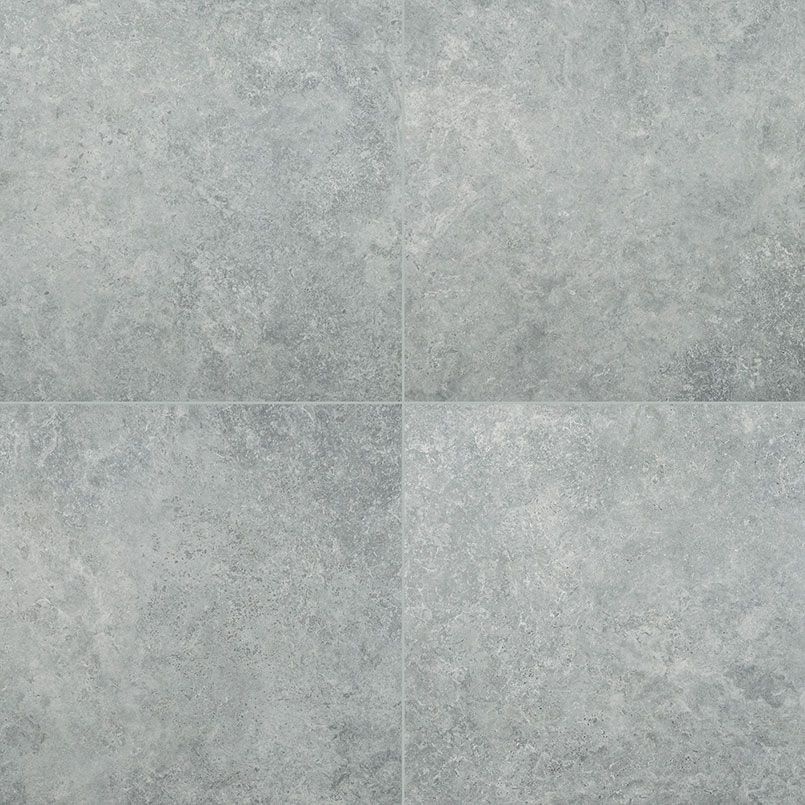Four square gray textured tiles, arranged in a grid pattern.